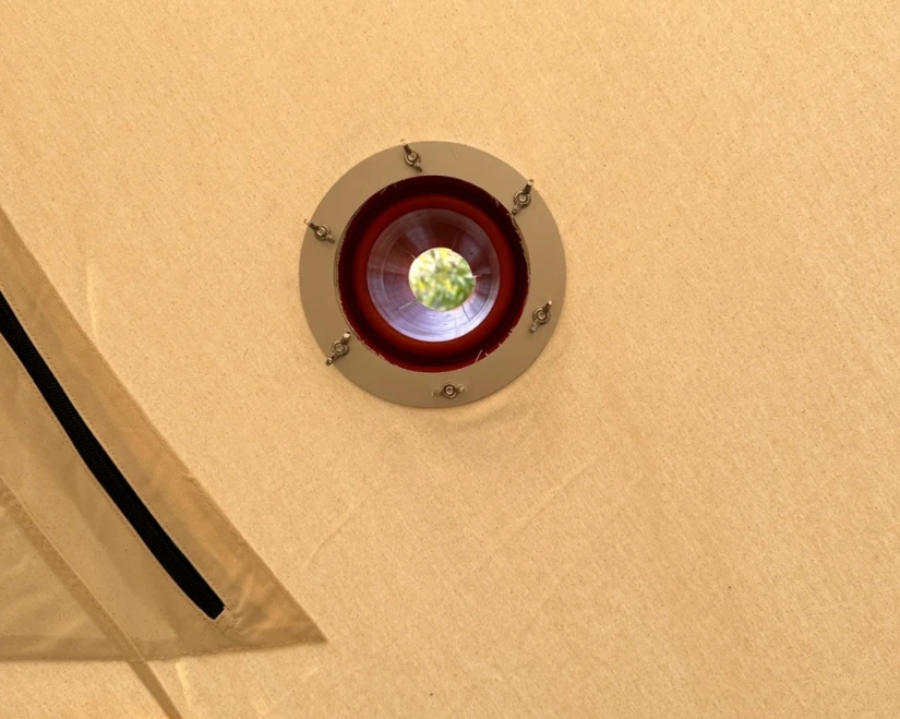 So installieren Sie ein Rauchrohr an einem Zeltofen aus Segeltuch